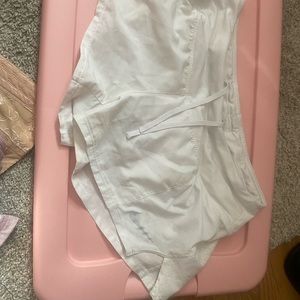 White Nike shorts